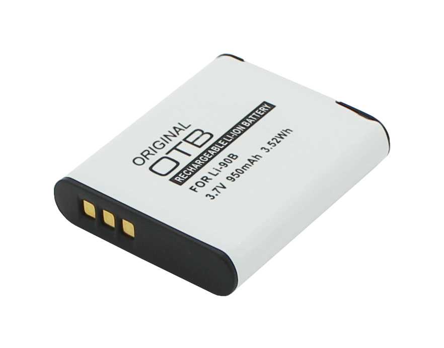 Weißer Kameraakku mit schwarzem Rand und drei goldenen Kontakten, schräg von oben fotografiert