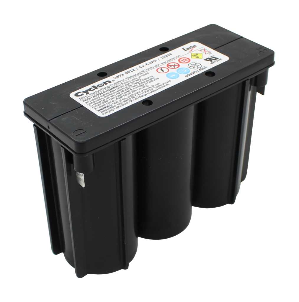 Schwarzer Batteriebock mit drei zylindrischen Kammern, zwei Metallkontakten und Warnetikett auf der Oberseite