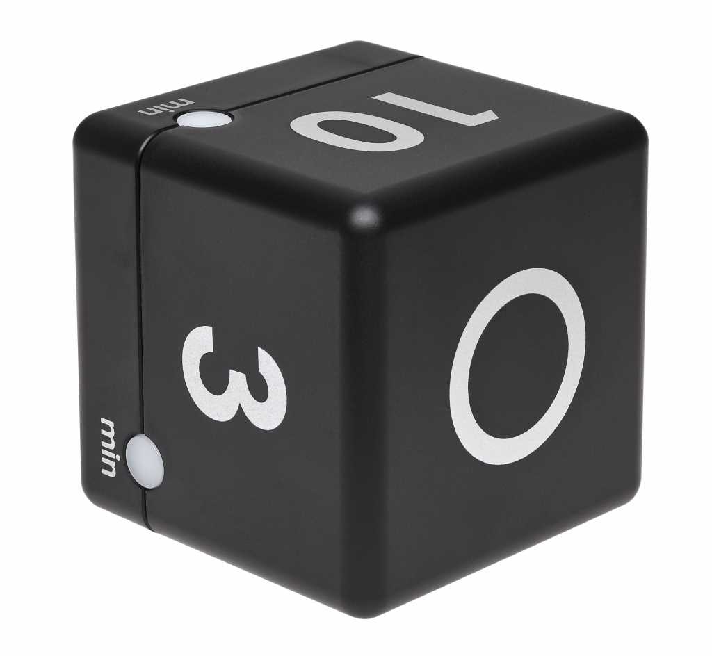Schwarzer Würfel mit weißen Ziffern 10, 3 und 0 sowie zwei runden Tasten an der Kante auf weißem Hintergrund