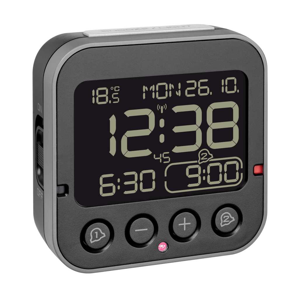 Schwarzer Digitalwecker mit großem Display, zeigt 12:38, 18,5 °C, Wochentag und Datum sowie Tasten an der Front