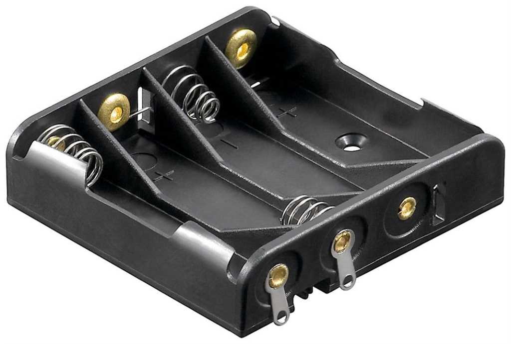 Schwarzer Batteriehalter mit vier Fächern, Federkontakten und zwei Metalllaschen an der Vorderseite