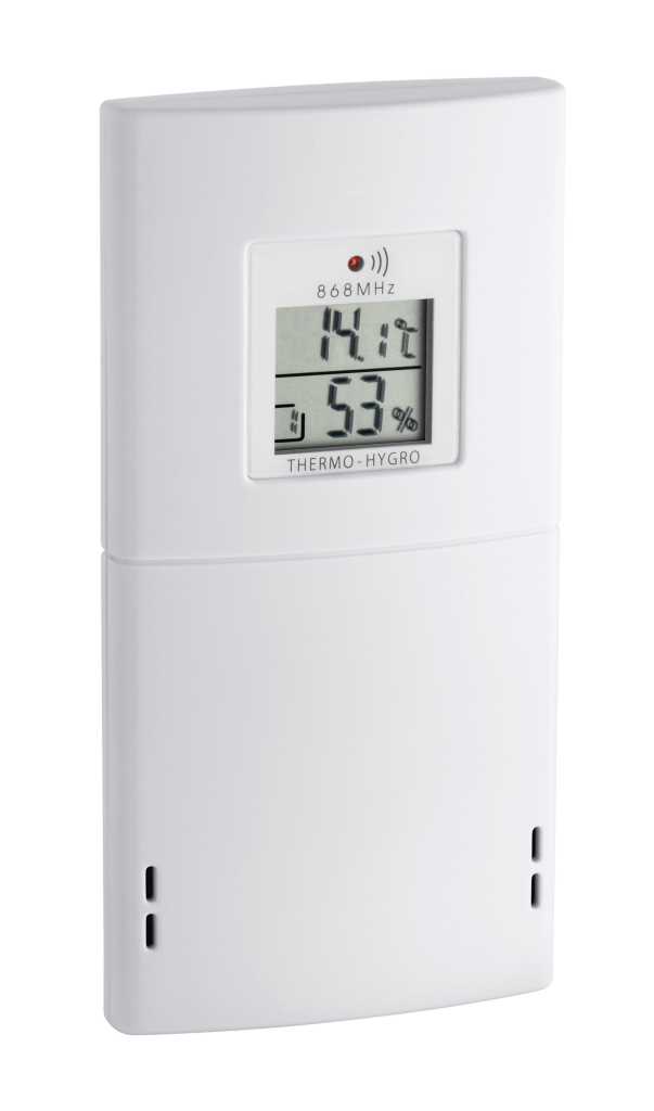 Weißes Gerät mit kleinem LCD-Display für Temperatur und Luftfeuchtigkeit, oben rote LED und Funksymbol sichtbar