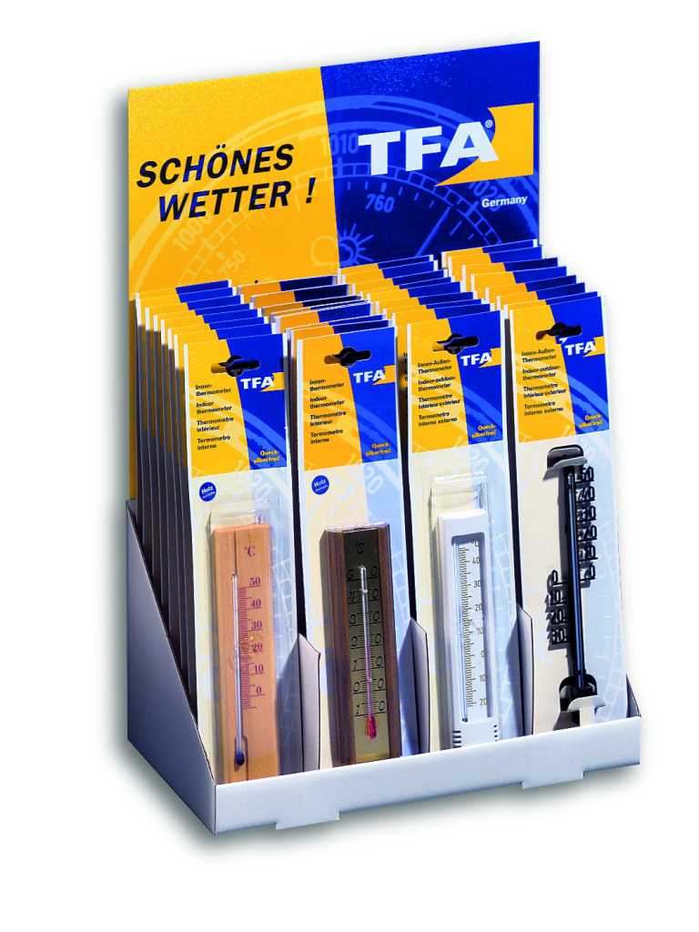 Thekendisplay mit mehreren verpackten Thermometern in Blau-Gelb, vier verschiedene Modelle vorn sichtbar, Pappschild hinten