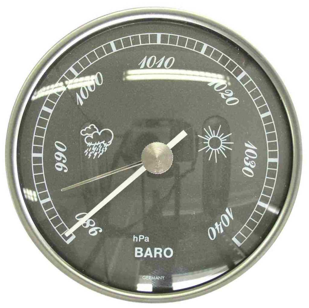 Rundes Barometer mit schwarzem Zifferblatt, Edelstahlring, Skala 960–1040 und Zeigern sowie Wetter-Symbolen