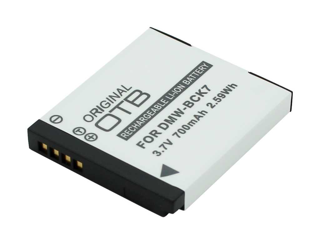 Weißer Kameraakku mit schwarzem Rand und sichtbaren goldenen Kontakten an einer Ecke